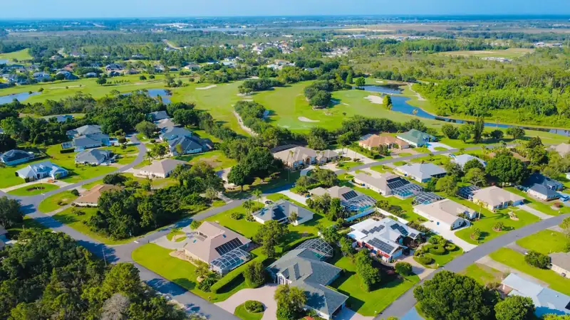 A Florida subdivision with lakes and golf fairways from above